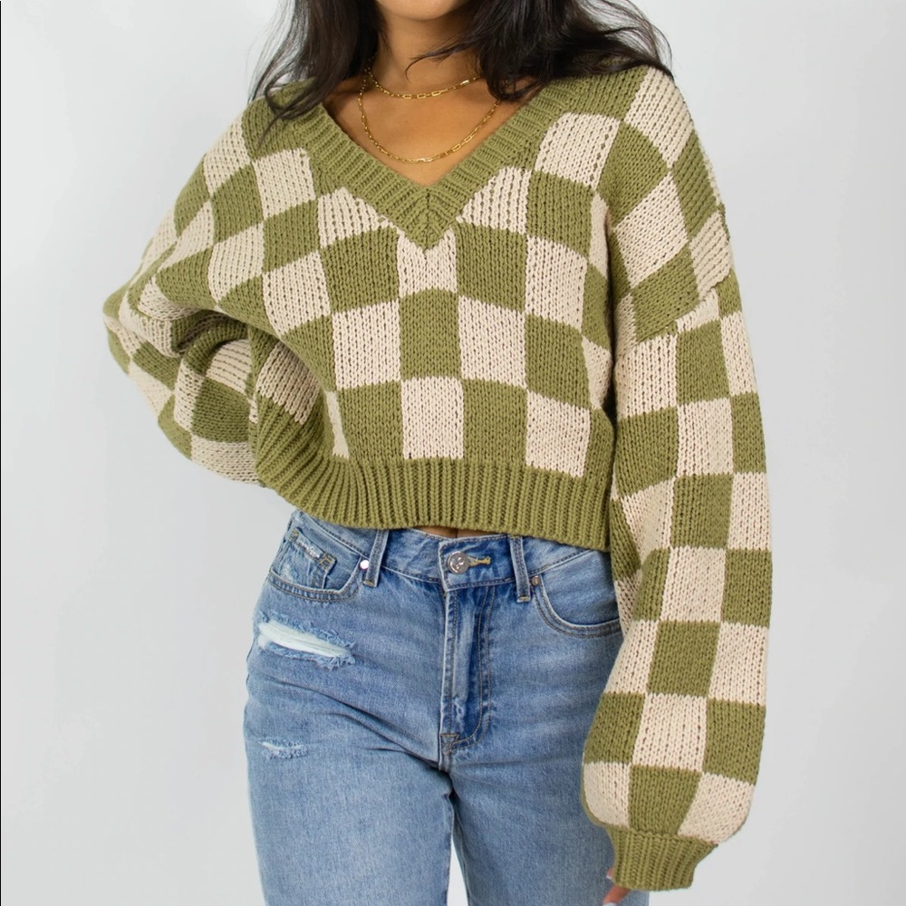 grey bandit in check sweater